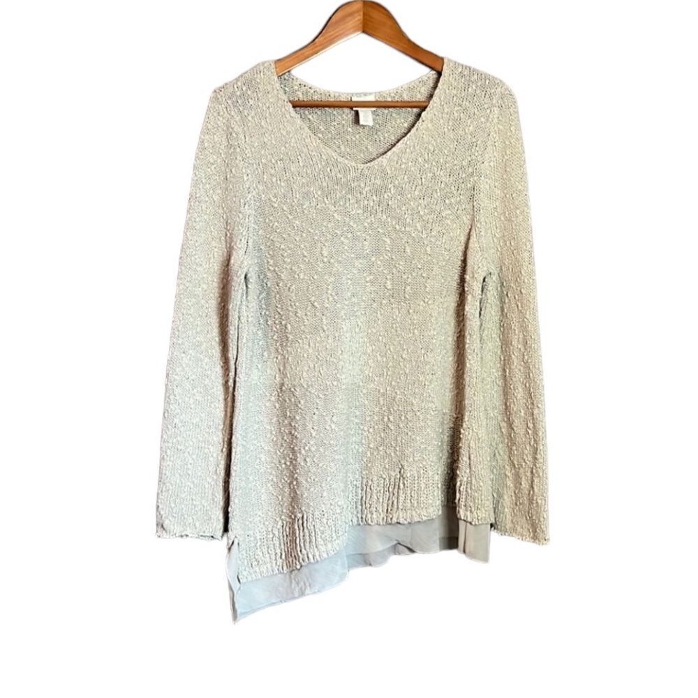 âChicoâsâmetallicâasymmetricâknitâsweater.